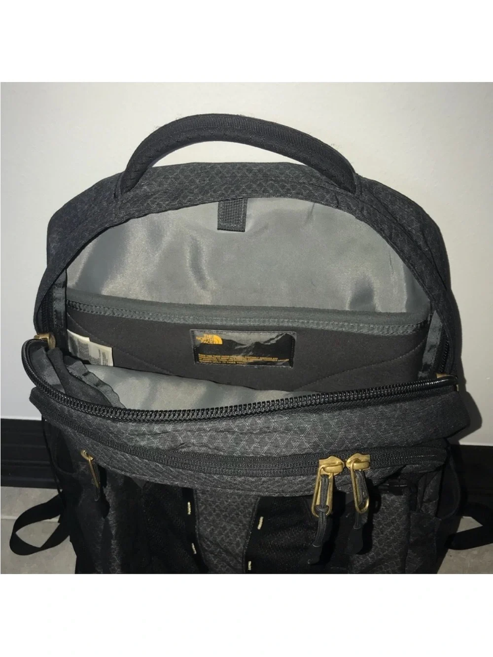 The North Face Black Backpack with Gold Accents Women’s